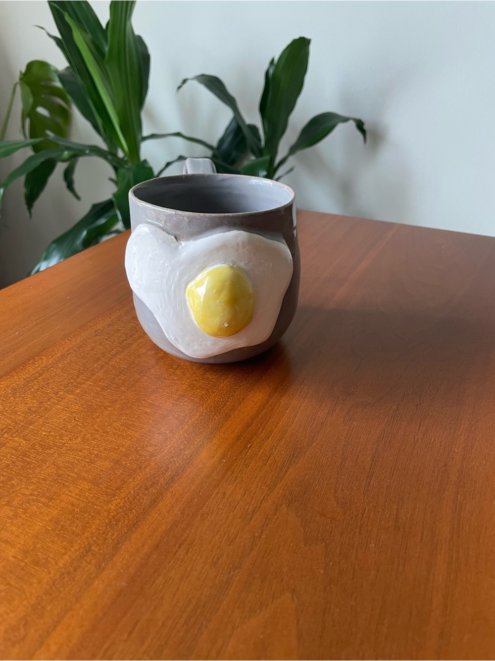 Handcrafted Gray Ceramic Mug with Sunny Egg Design